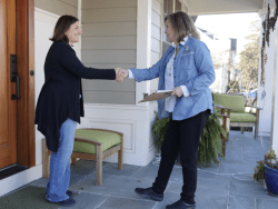 Tree Montgomery staff meets with resident